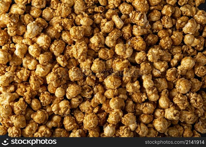 Heap of Caramel Popcorn Background. Close up
