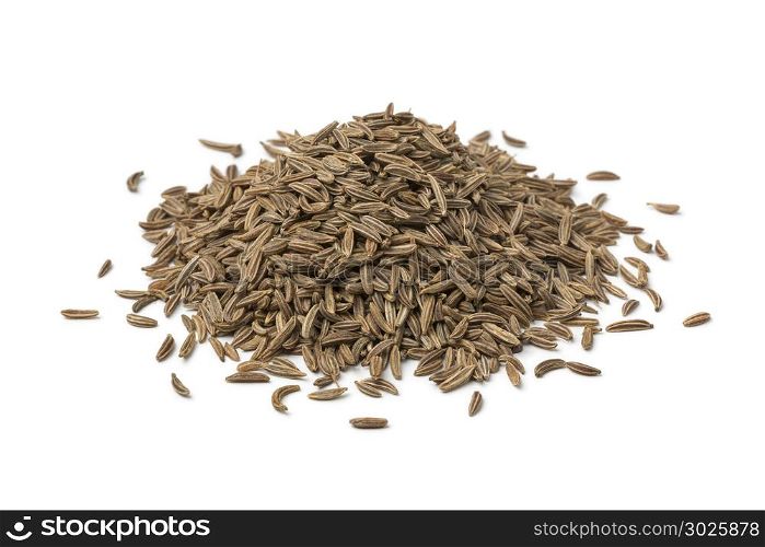 Heap of Caraway seeds isolated on white background