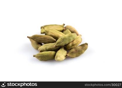 Heap of cardamom pods isolated on a white background