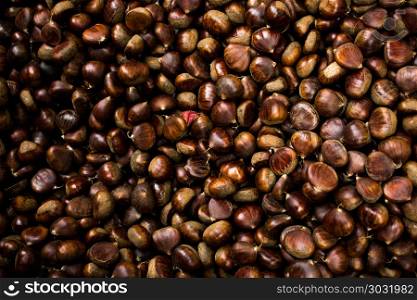 Heap of chestnut for autumn food background. Heap of chestnut for the autumn food background