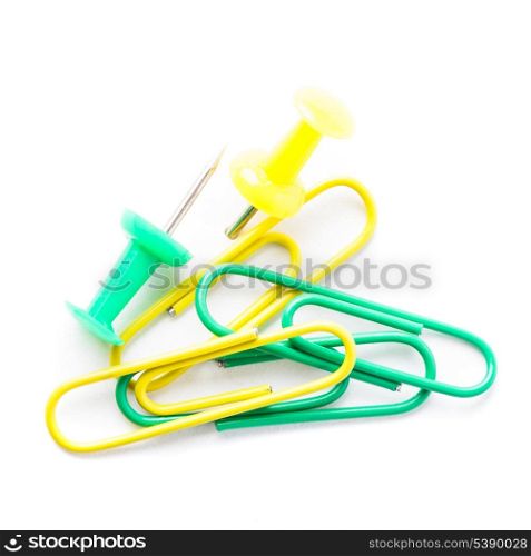 Heap of clips and pins isolated on white