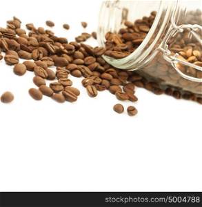 Heap of coffee beans from jar