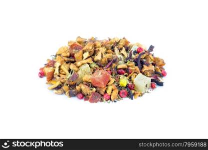 Heap of colorful loose hot pineapple tea isolated on white
