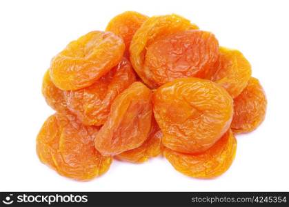 heap of dried apricots over white