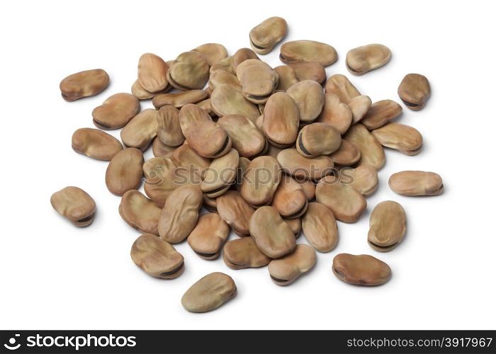 Heap of dried broad beans on white background