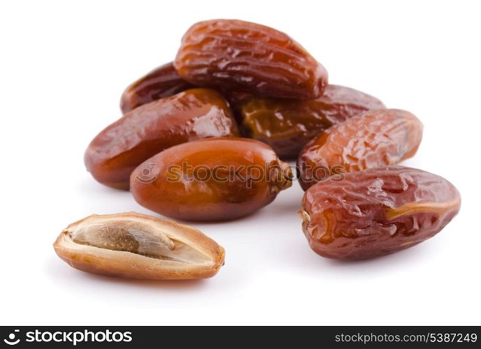 Heap of dried date fruit isolated on white