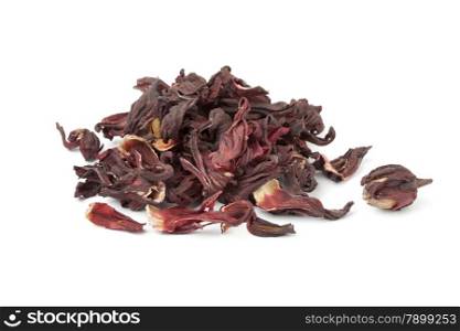 Heap of dried hibiscus flowers on white background