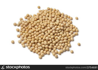 Heap of dried soybeans on white background