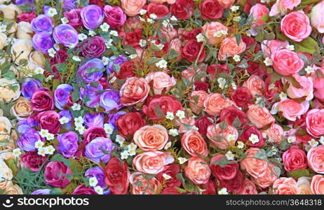 Heap of Fake rose flower using as love and beauty conceptual background