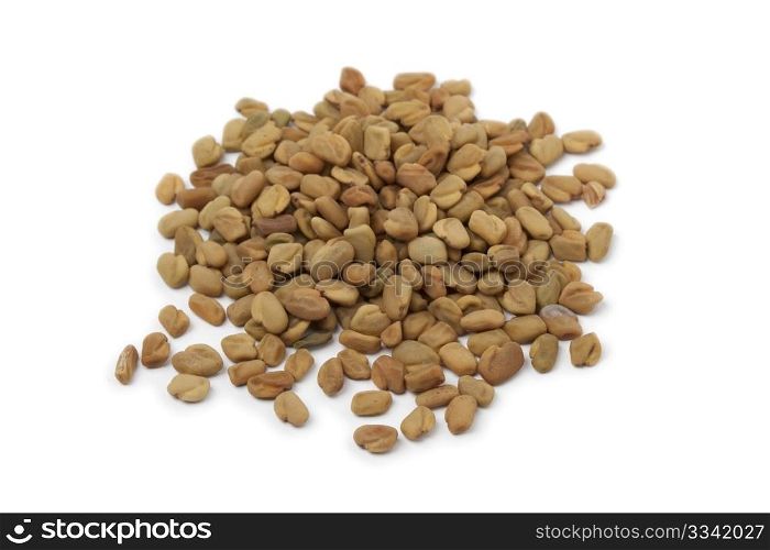 Heap of Fenugreek seeds on white background
