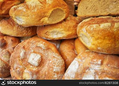 Heap of fresh baked buns on trading tray