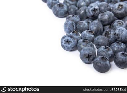 Heap of fresh blueberry berries isolated on white background