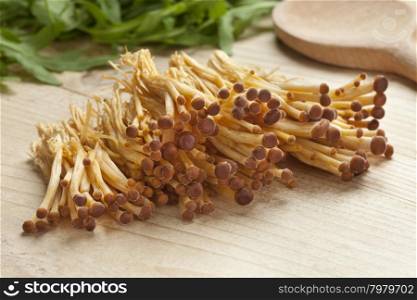 Heap of fresh golden Enoki mushrooms
