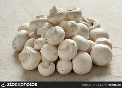 Heap of fresh raw button mushrooms