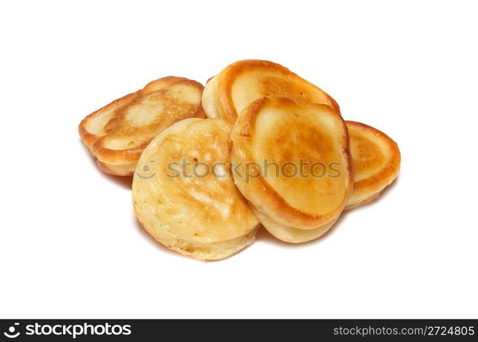 Heap of fried fritters isolated on white