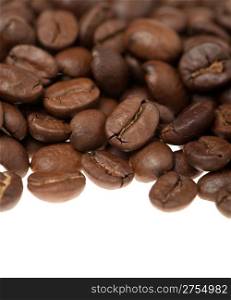 Heap of grains of coffee. It is isolated on a white background