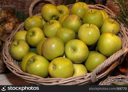 Heap of Green Apples in Wicker Box for Sale in Market