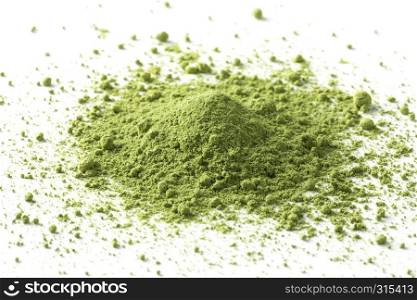 Heap of green Japanese Matcha tea powder close up