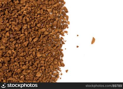 Heap of instant coffee for background closeup on white