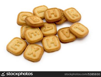 Heap of letter cookies isolated on white