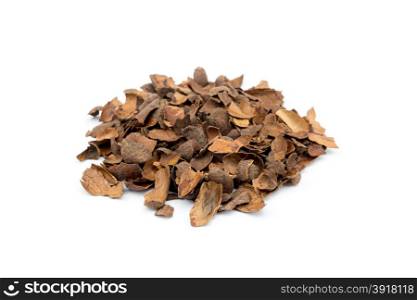 Heap of loose empty cacao shells isolated on white background