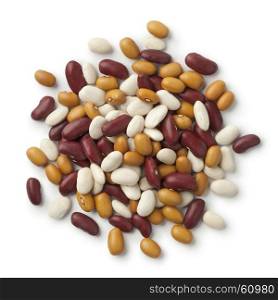 Heap of mixed organic colorful beans on white background