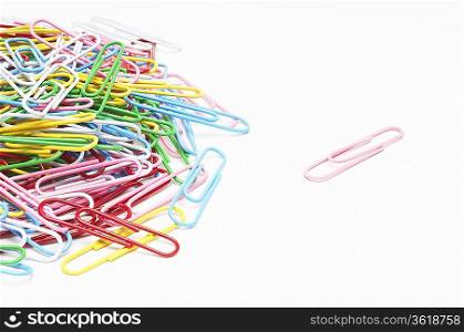 Heap of multi colored paper clips