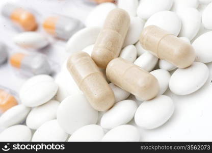 heap of pills isolated on the white background