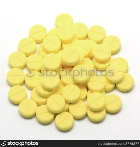 heap of pills isolated on white background