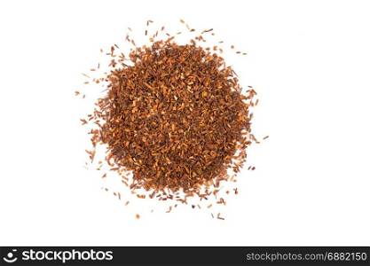 Heap of red dry rooibos healthy traditional organic tea on white isolated background