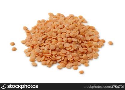 Heap of red lentils on white background