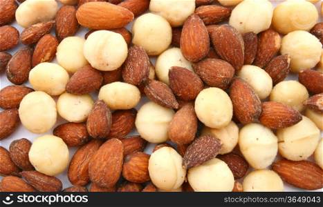 Heap of Roasted almond and macadamia using as Food background