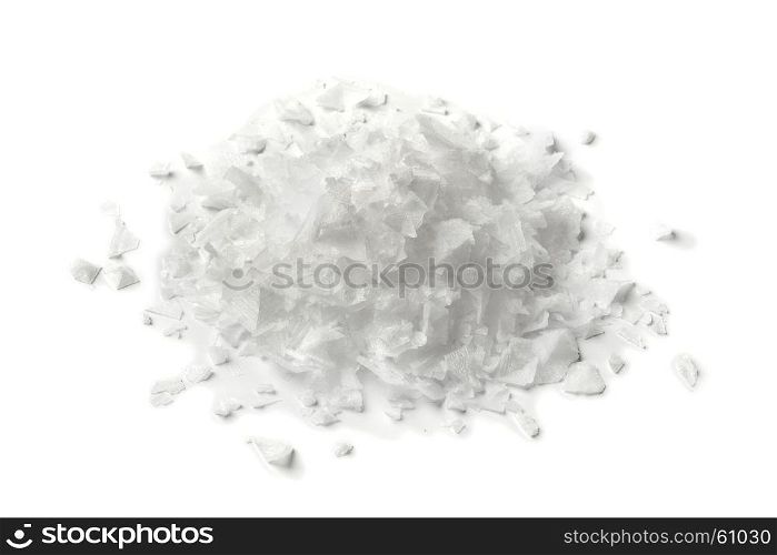 Heap of salt flakes on white background