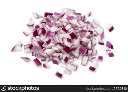 Heap of sliced fresh red onion close up isolated on white background 