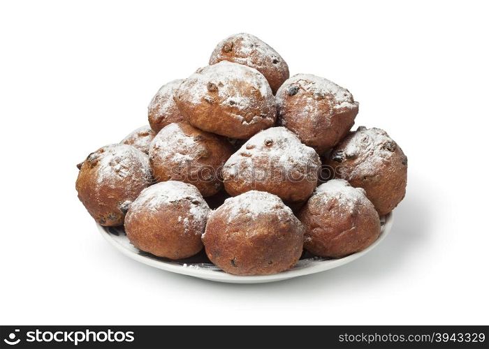 Heap of sugared fried fritters or oliebollen on white background
