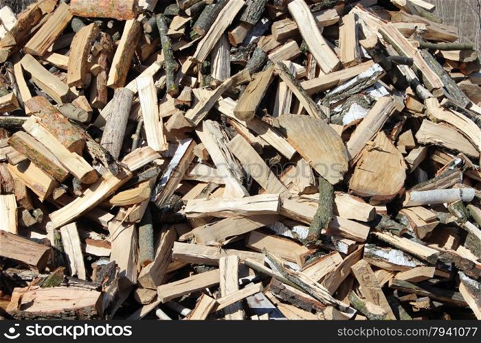 Heap of the prepared fire wood. big heap of the prepared fire wood