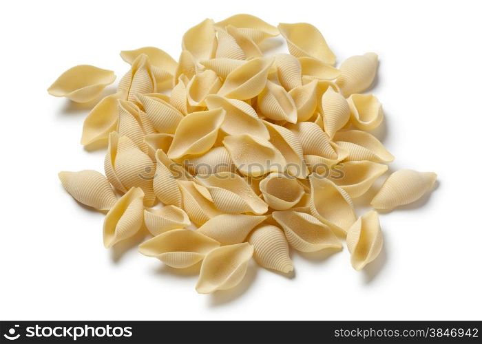 Heap of traditional Italian conchiglie on white background