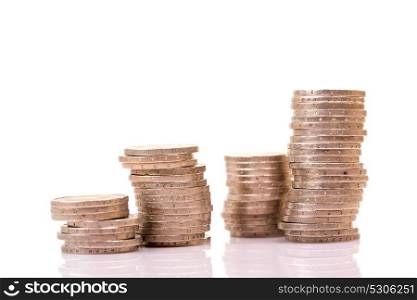 Heap of two euro coins isolated on white background