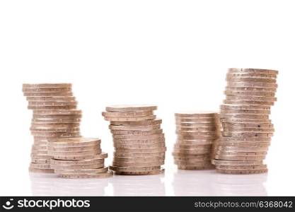 Heap of two euro coins isolated on white background