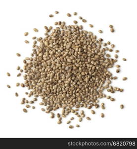 Heap of unshelled hemp seeds on white background