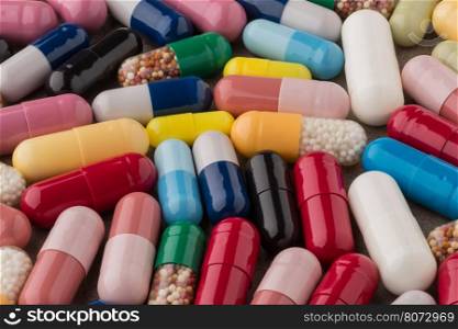 Heap of various colorful capsules. Various colorful medical pills and capsules closeup