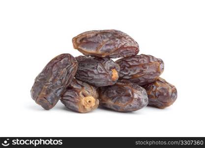 Heap of whole dried dates on white background