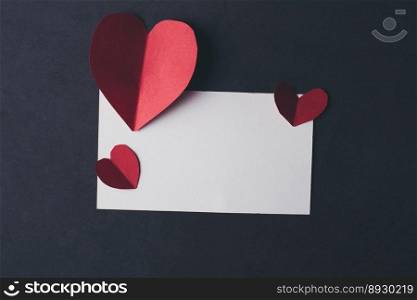 Heart and blank with note card on Red background