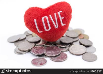 Heart and coins on white background