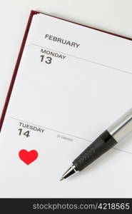 Heart and Pen on Valentine&rsquo;s Day in a diary