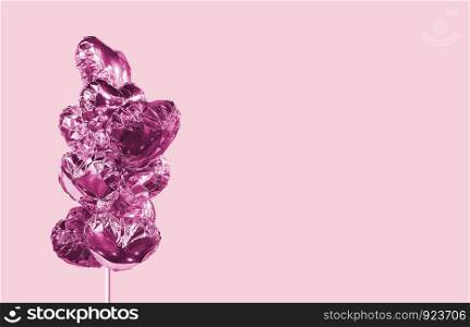 Heart balloons isolated on pink background minimal style