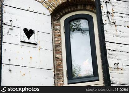 Heart carved shutters in Amsterdam, Holland