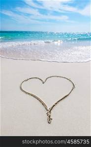 Heart drawn in the sand. Heart drawn in the sand of tropical sea beach