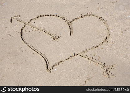 Heart drawn on sand for the day of St. valentine