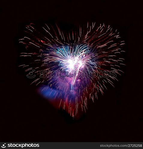 Heart fireworks on the black sky background